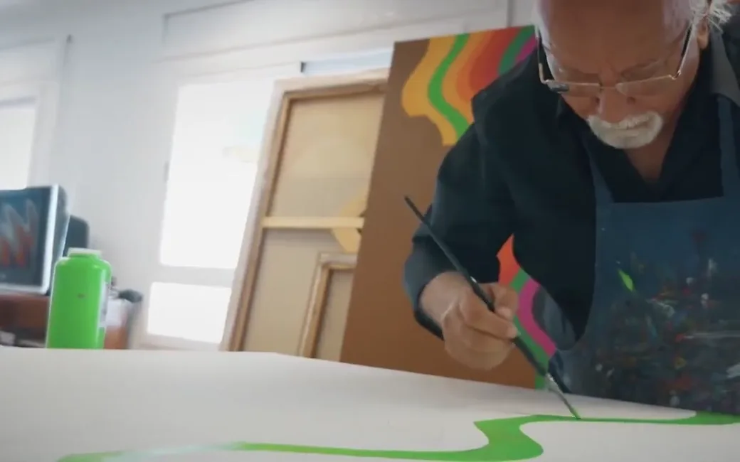 Mohamed Melehi painting in the foundation website's opening film.